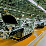 unfinished automobiles in a car plant